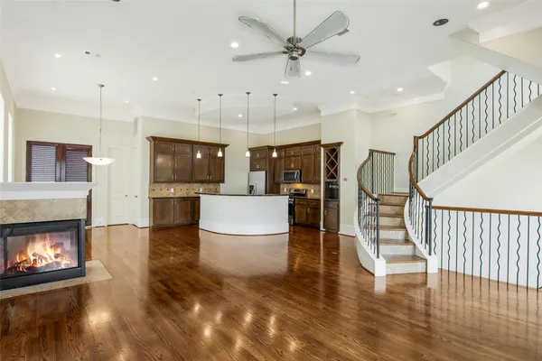 a view of a kitchen with furniture and a fireplace
