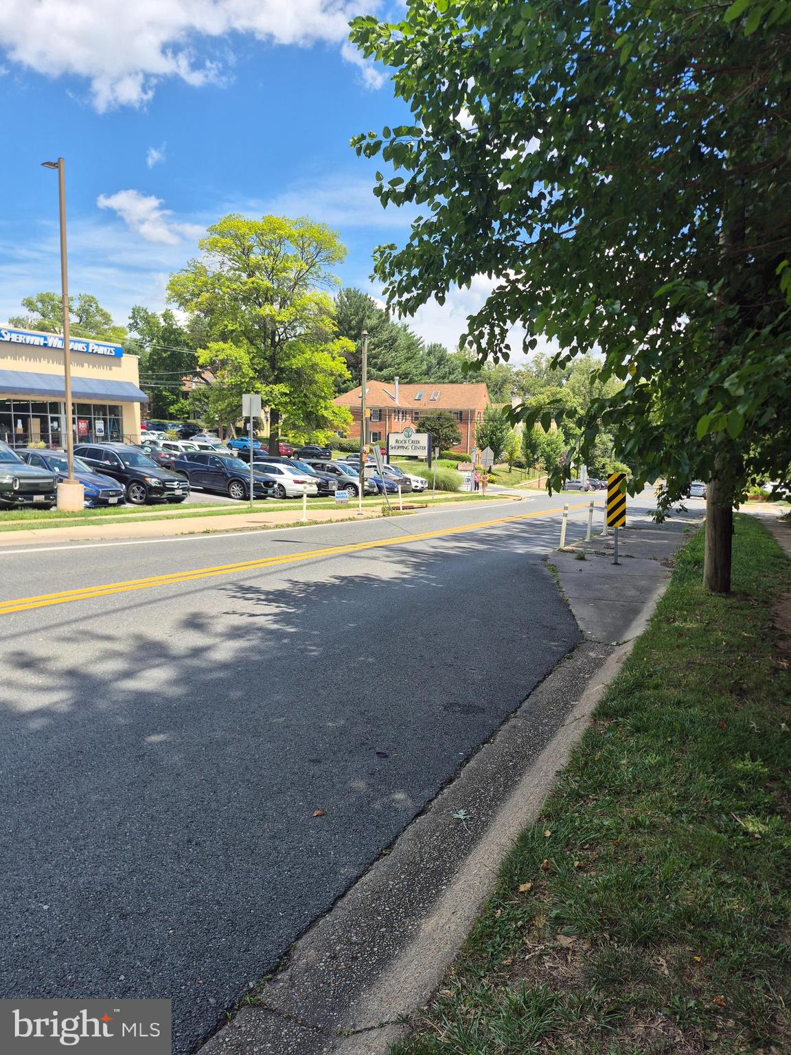 2213 Washington Avenue, Unit 101 Silver Spring, MD 20910 - Photo 19 of 25 a view of a street with a building in the background