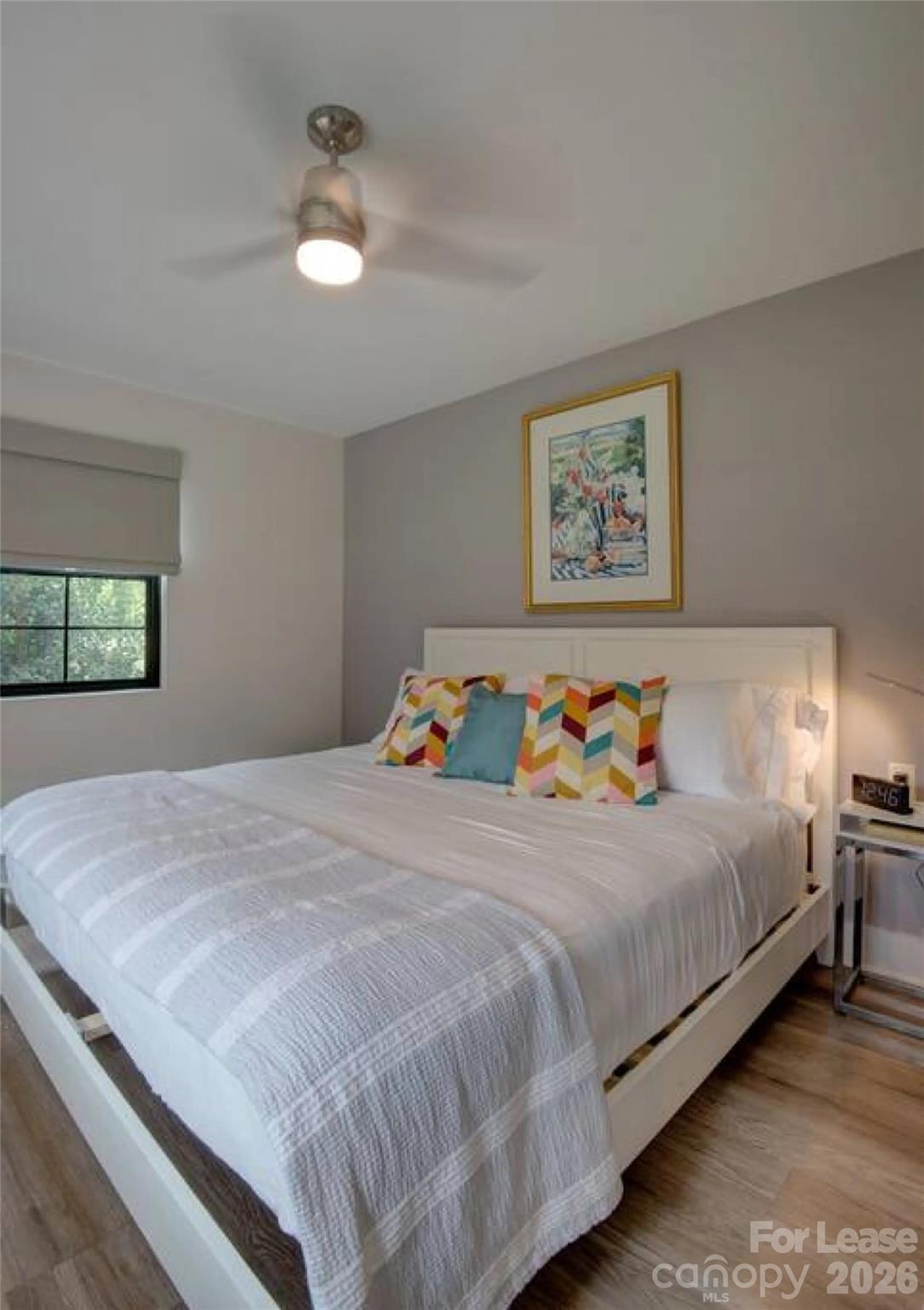 3945 Rockfern Road, Unit A Charlotte, NC 28217 - Photo 21 of 38 a bedroom with bed and window