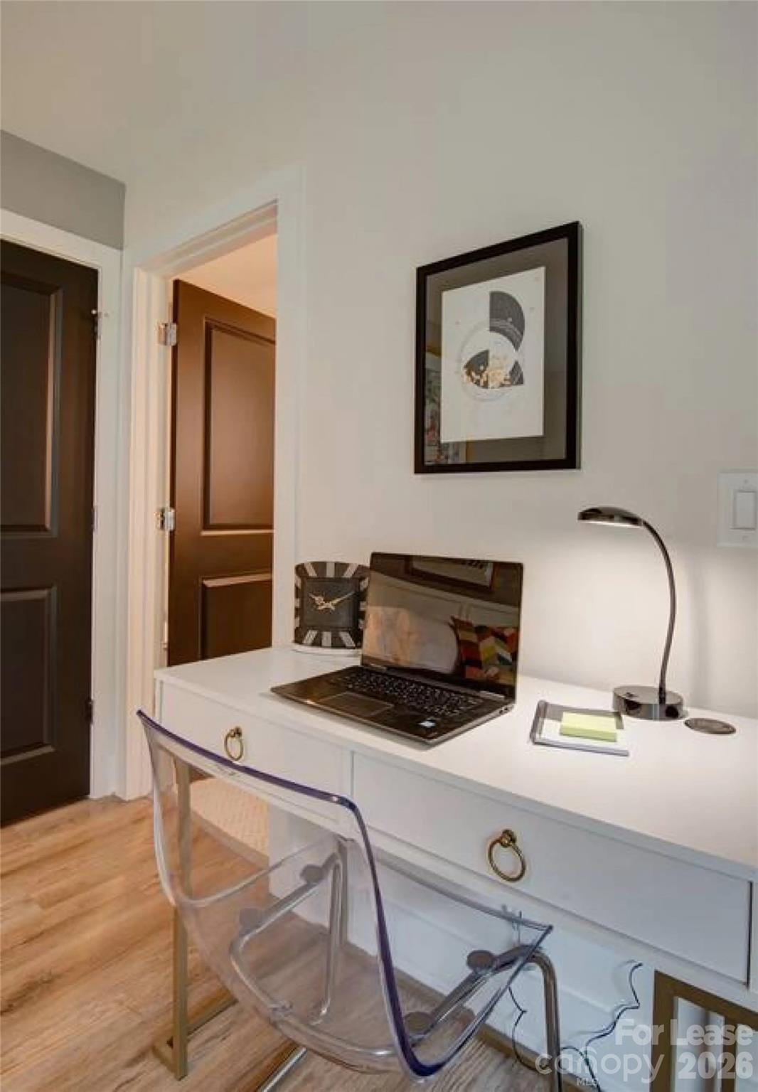 3945 Rockfern Road, Unit A Charlotte, NC 28217 - Photo 24 of 38 a kitchen with a table and chairs