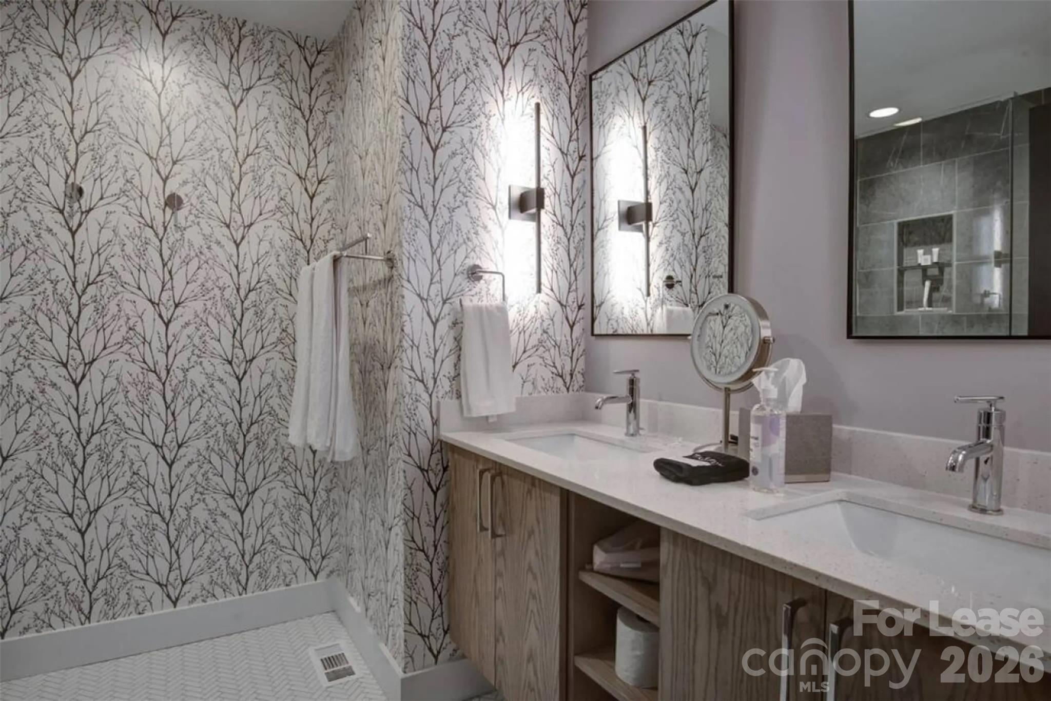3945 Rockfern Road, Unit A Charlotte, NC 28217 - Photo 25 of 38 a bathroom with a sink and a mirror