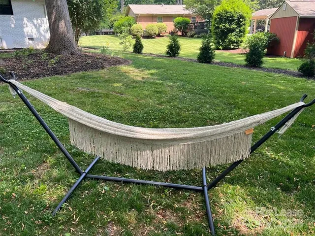 a view of a backyard with plants