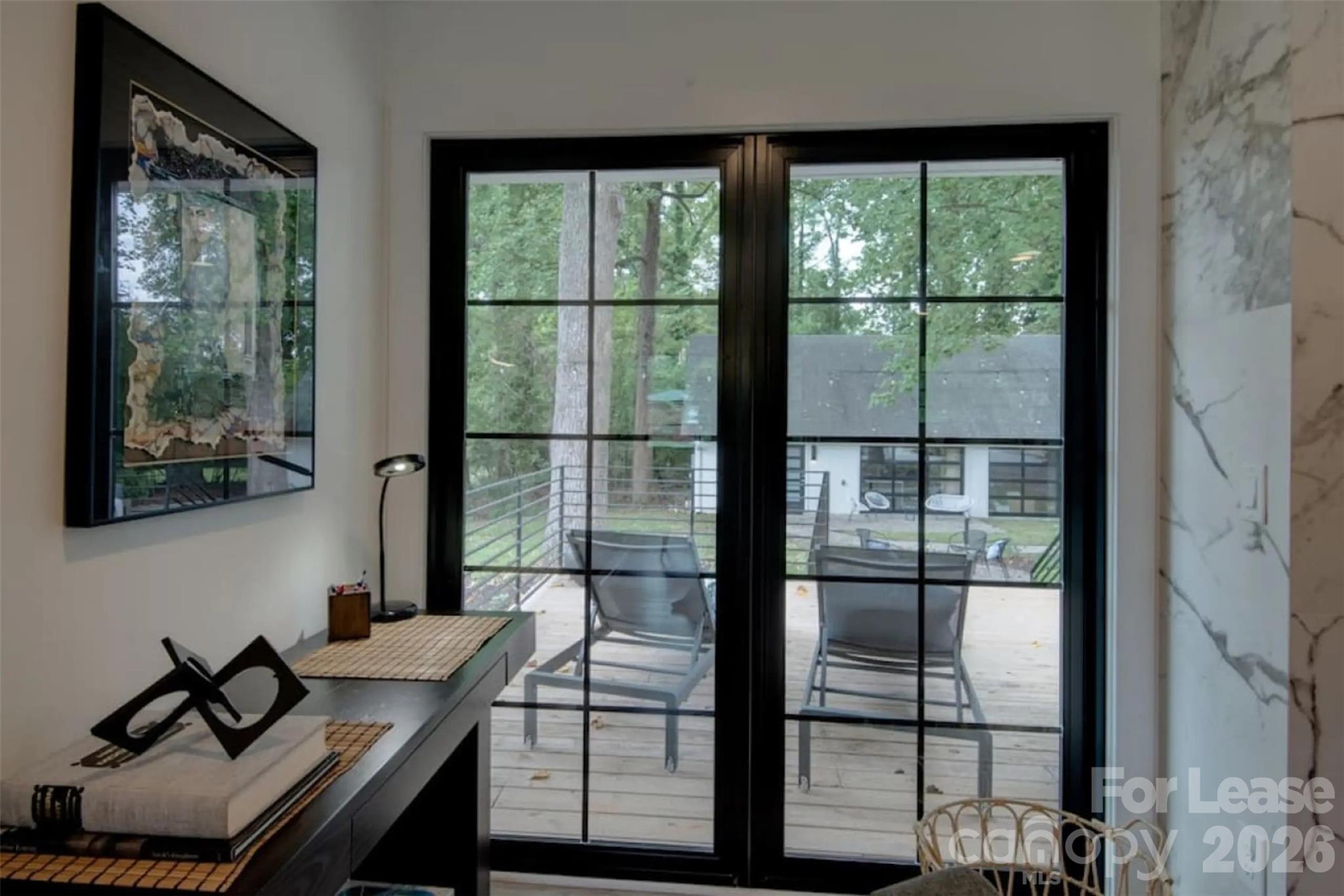 3945 Rockfern Road, Unit A Charlotte, NC 28217 - Photo 32 of 38 a view of a workspace with furniture and window