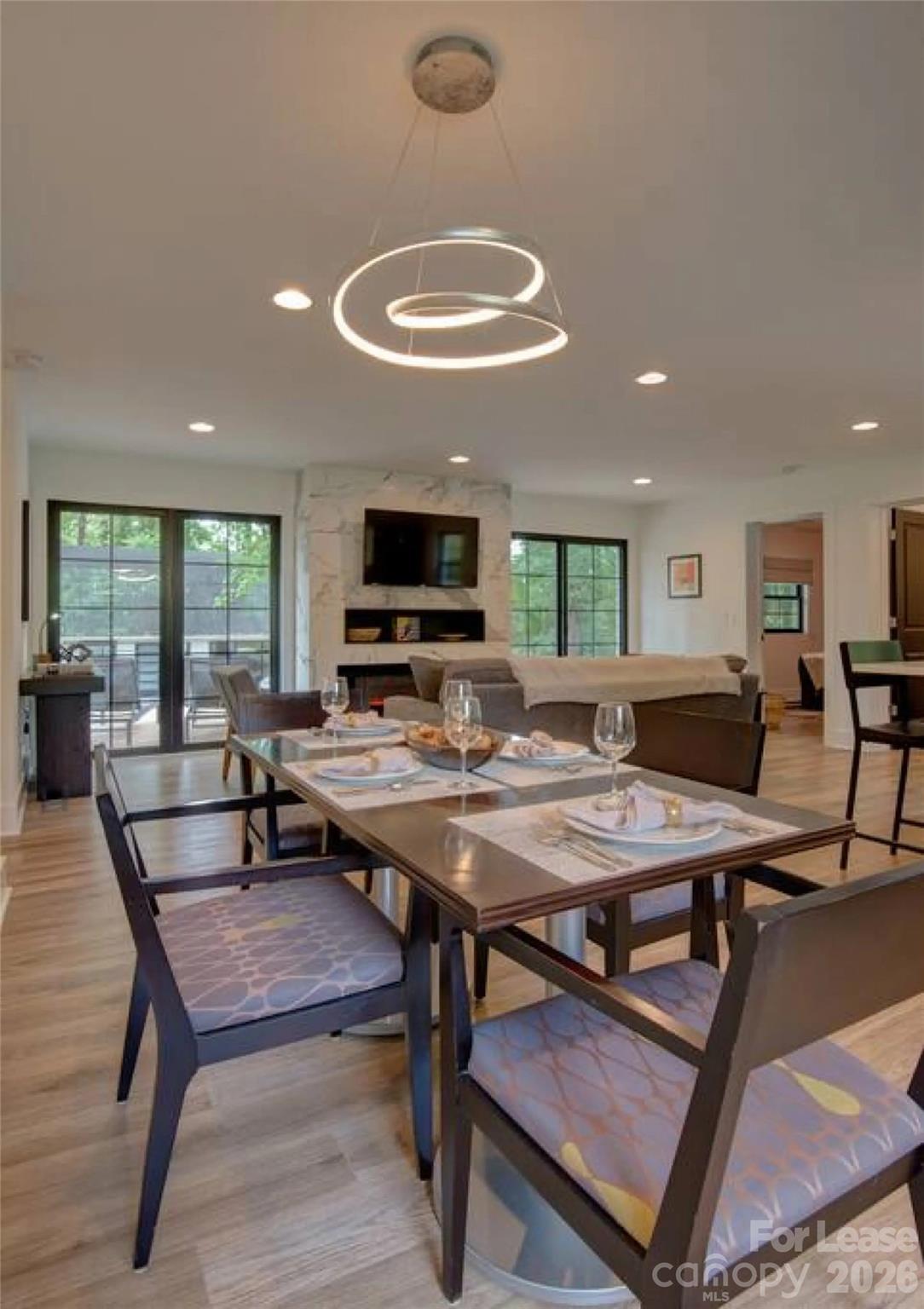 3945 Rockfern Road, Unit A Charlotte, NC 28217 - Photo 4 of 38 a view of a dining room with furniture