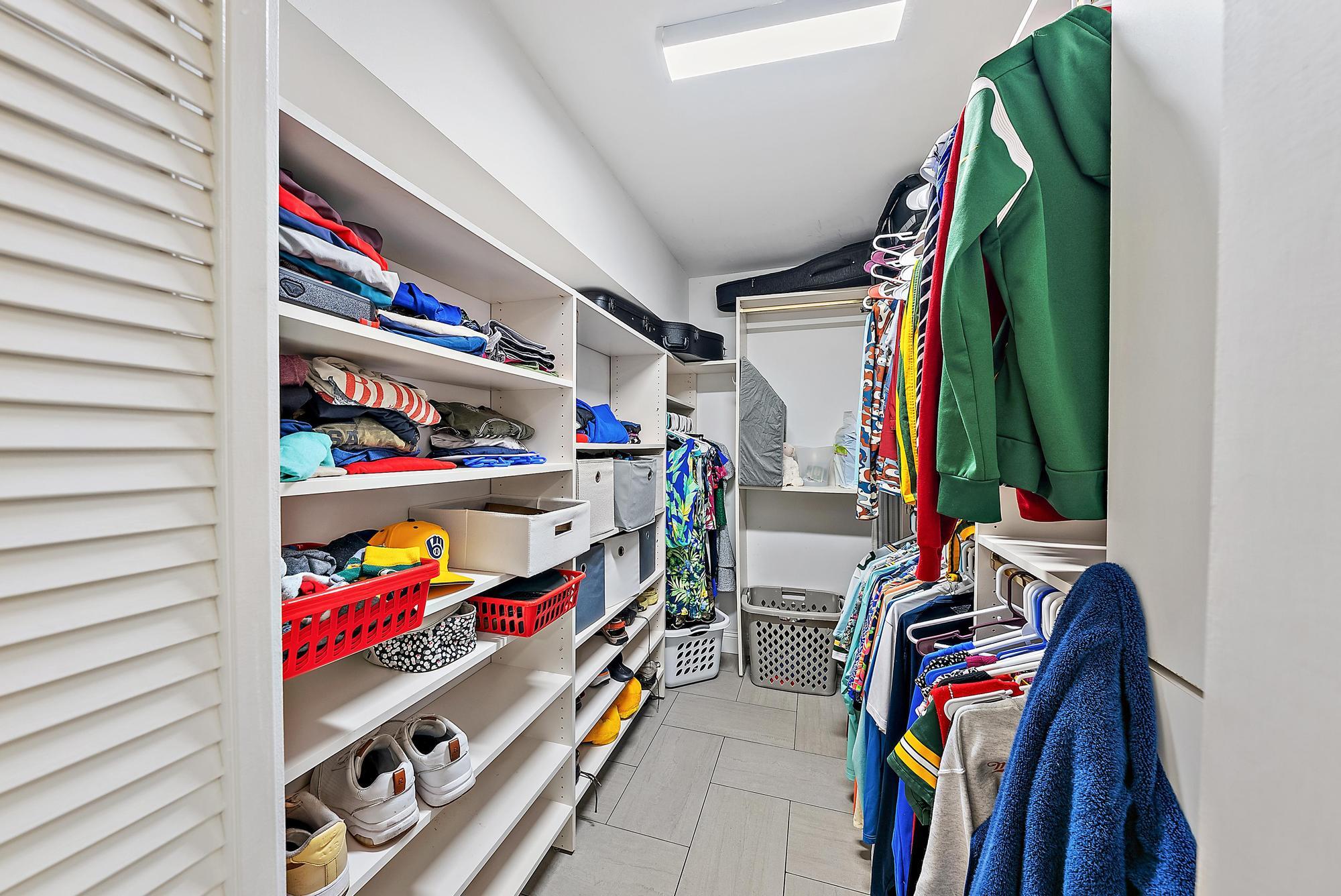 112 Spoonbill Court Jupiter, FL 33458 - Photo 14 of 28 a room with storage and utility