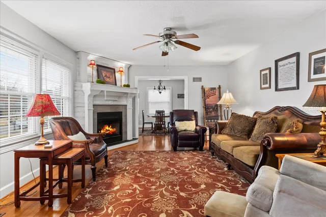 a view of a dining room with furniture and window