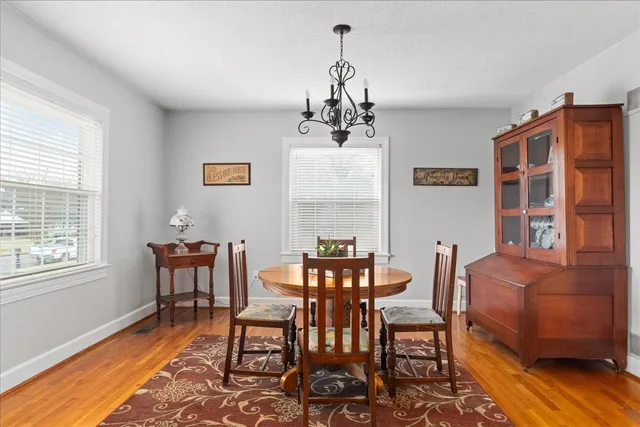 a kitchen with stainless steel appliances a stove a sink and a microwave
