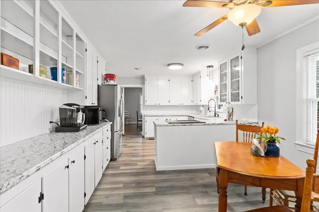 a view of a livingroom with furniture and window