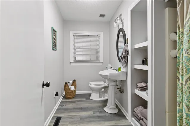 a picture of a book and a bed