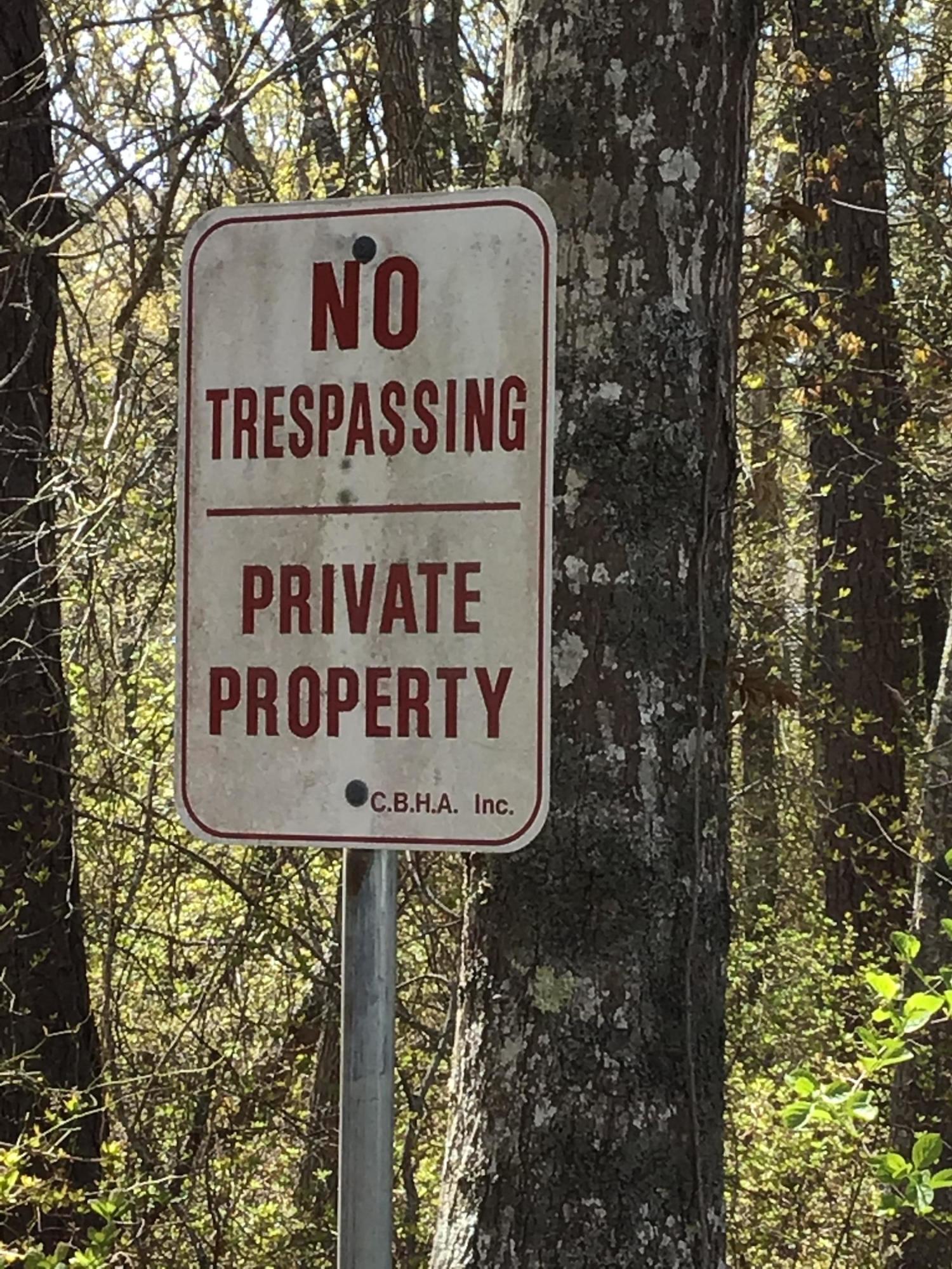 114 Sullivan Road West Yarmouth, MA 02673 - Photo 11 of 41 a sign broad on the wooden wall