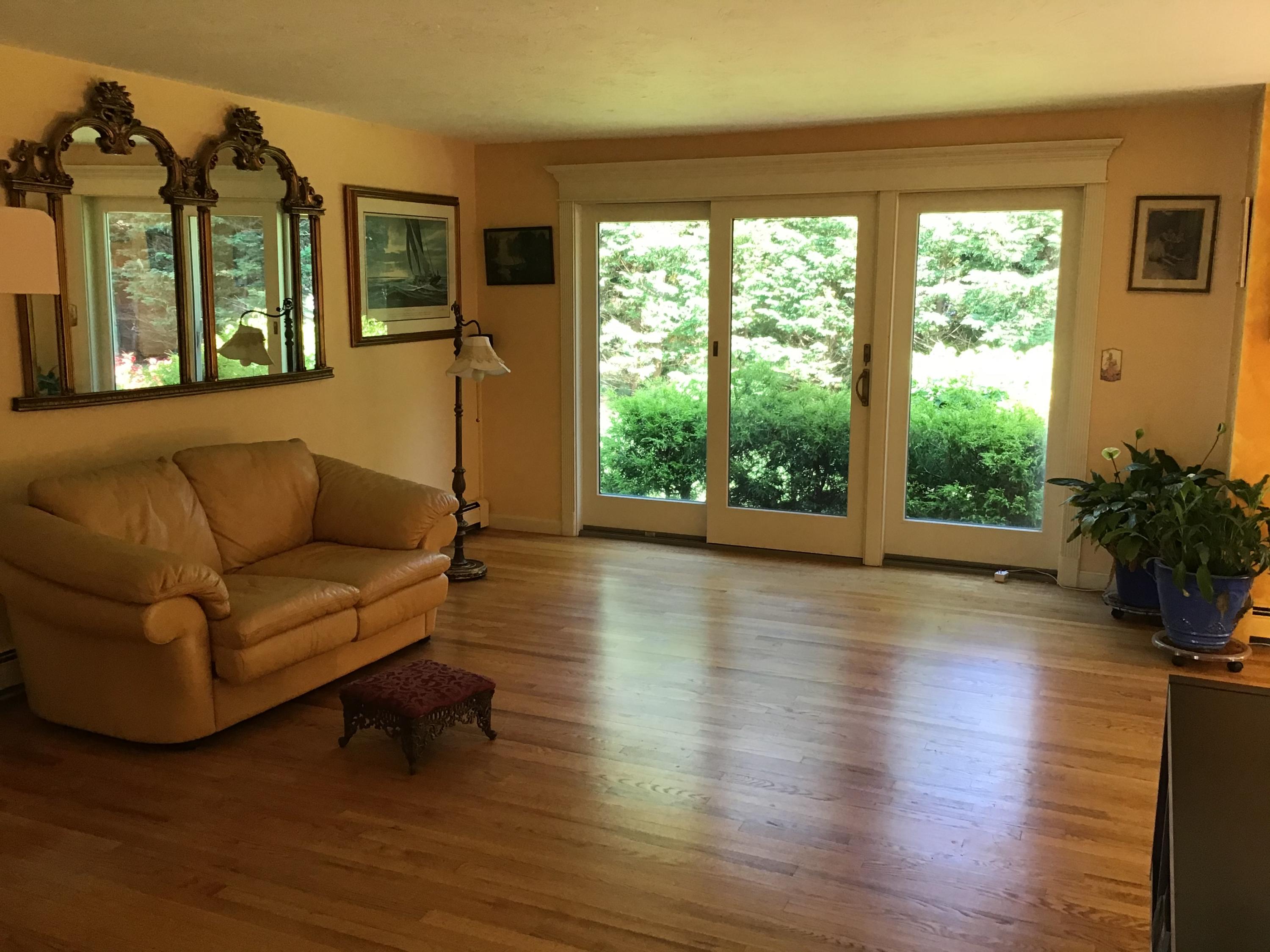 114 Sullivan Road West Yarmouth, MA 02673 - Photo 24 of 41 a living room with furniture and a large window