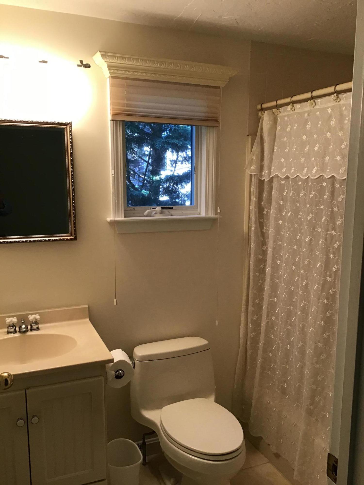 114 Sullivan Road West Yarmouth, MA 02673 - Photo 30 of 41 a bathroom with a toilet and a sink