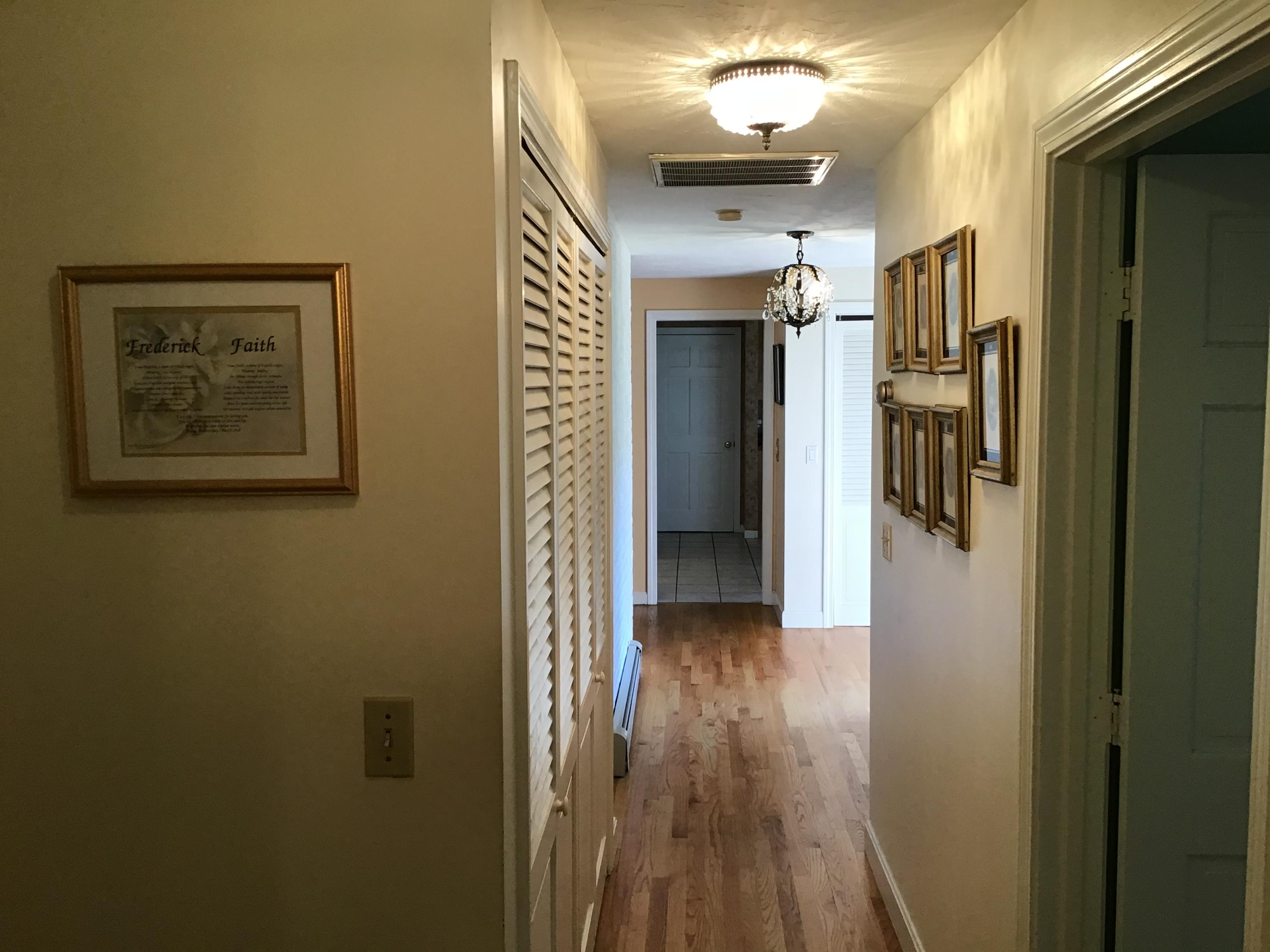 114 Sullivan Road West Yarmouth, MA 02673 - Photo 33 of 41 a view of hallway with wooden floor