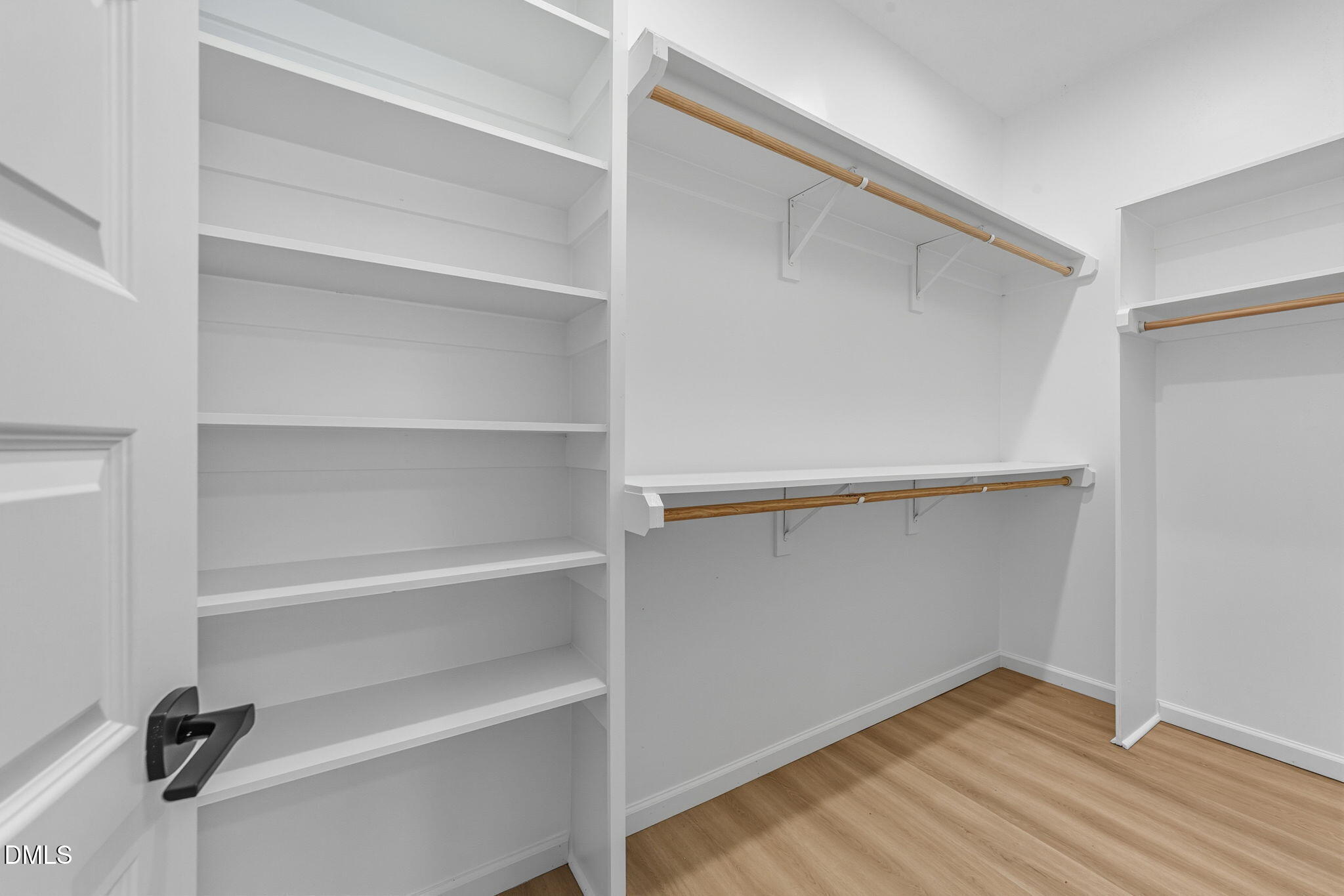 303 West 2nd Street Clayton, NC 27520 - Photo 14 of 44 a view of an empty walk in closet