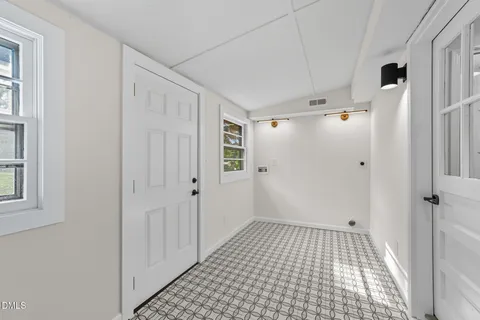 a view of a room with windows