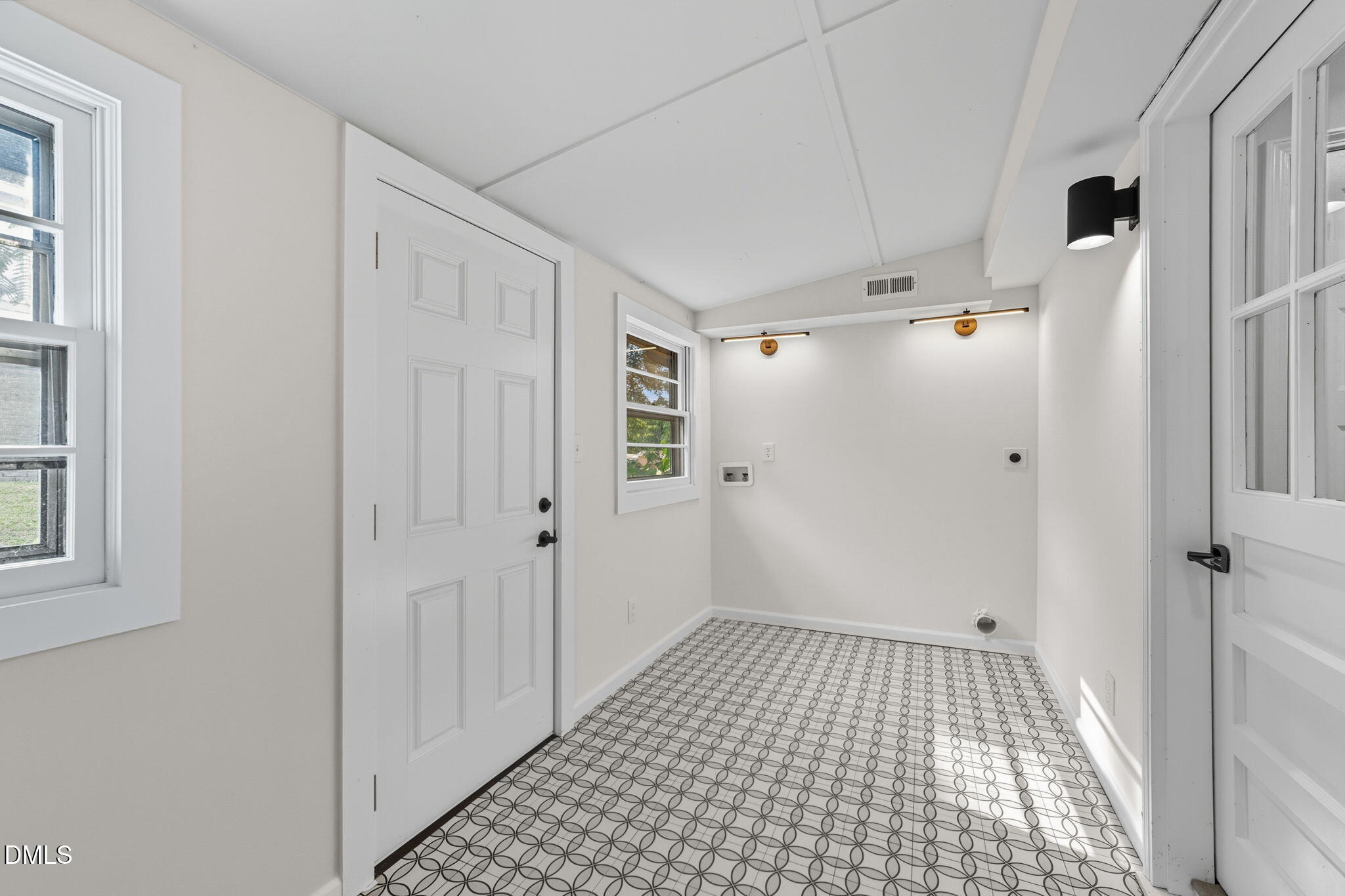 303 West 2nd Street Clayton, NC 27520 - Photo 27 of 44 a view of a bathroom with a walk in closet