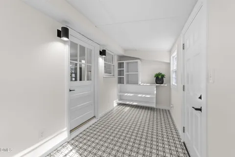 a bathroom with a sink a vanity and a mirror