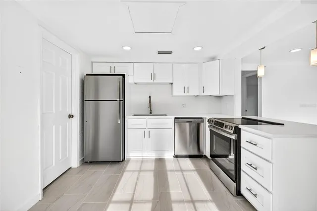 an empty room with a bathroom