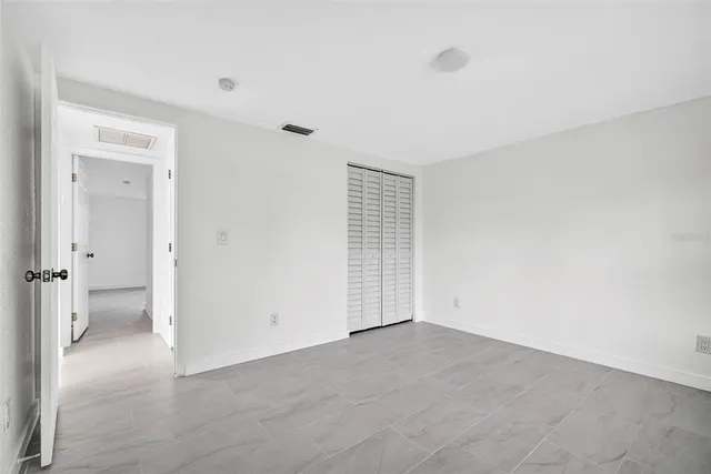 a view of a backyard with a patio