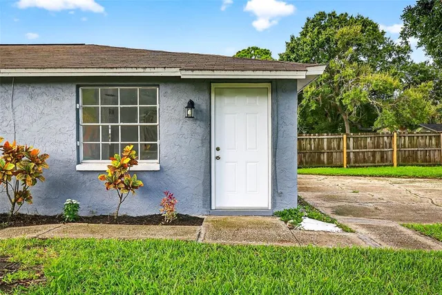 a view of a kitchen with a sink and a window