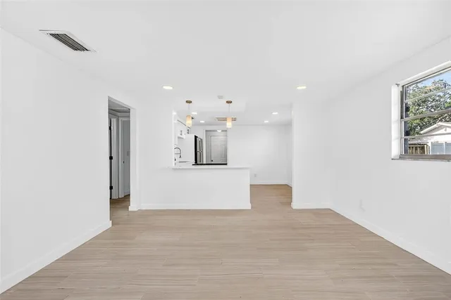 an empty room with window