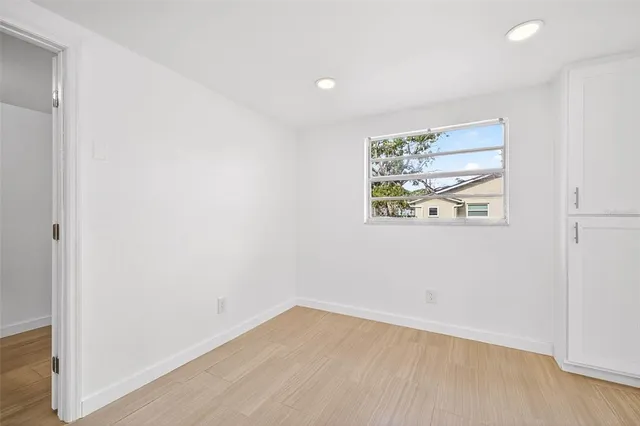 a view of a backyard with pathway