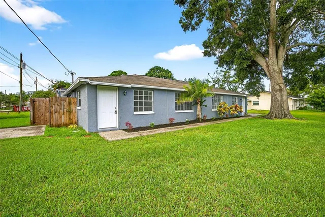 a kitchen with stainless steel appliances a refrigerator sink and cabinets