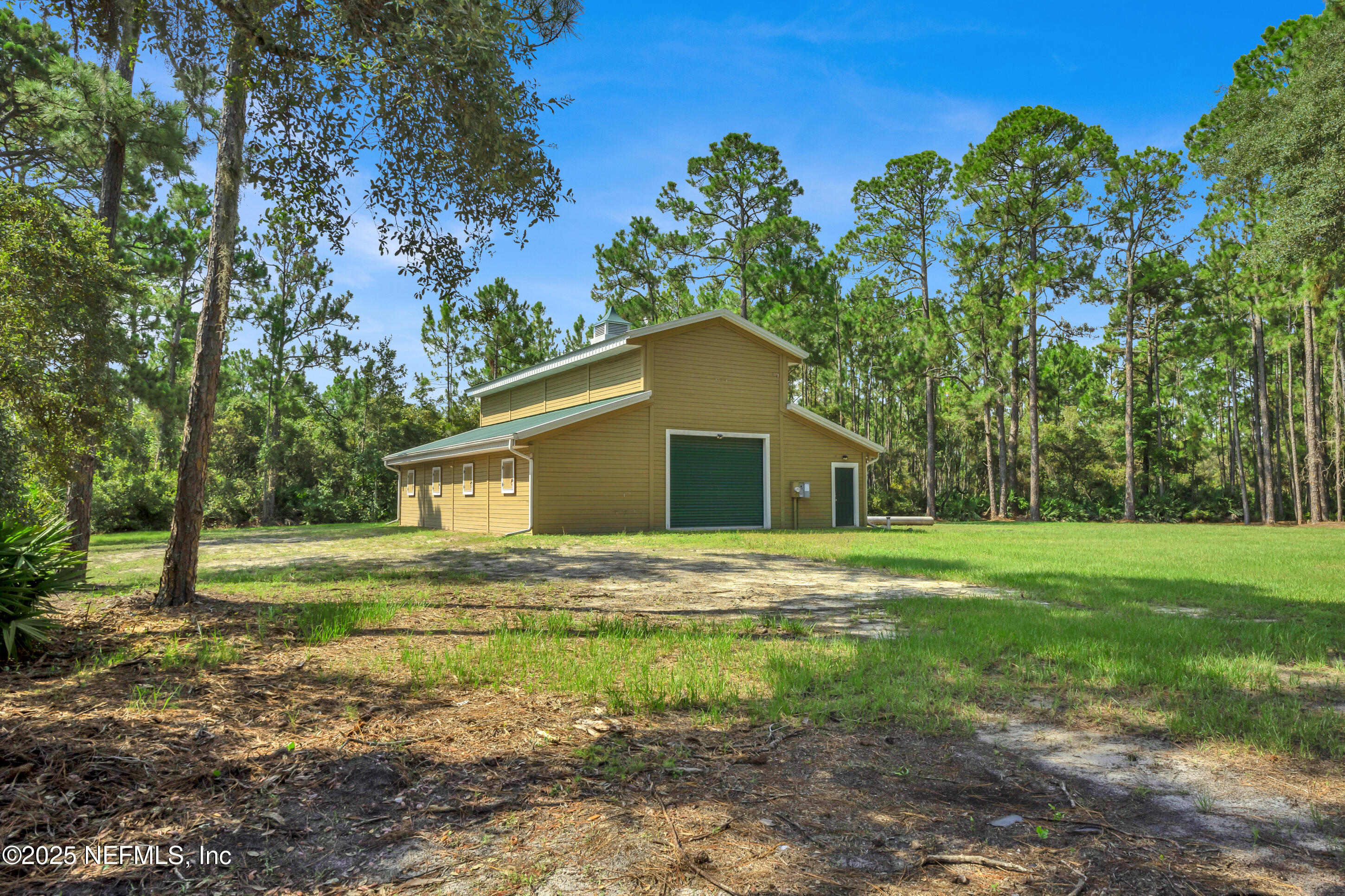 13091 Sawpit Road Jacksonville, FL 32226 - Photo 12 of 26 a house is sitting in middle of the forest