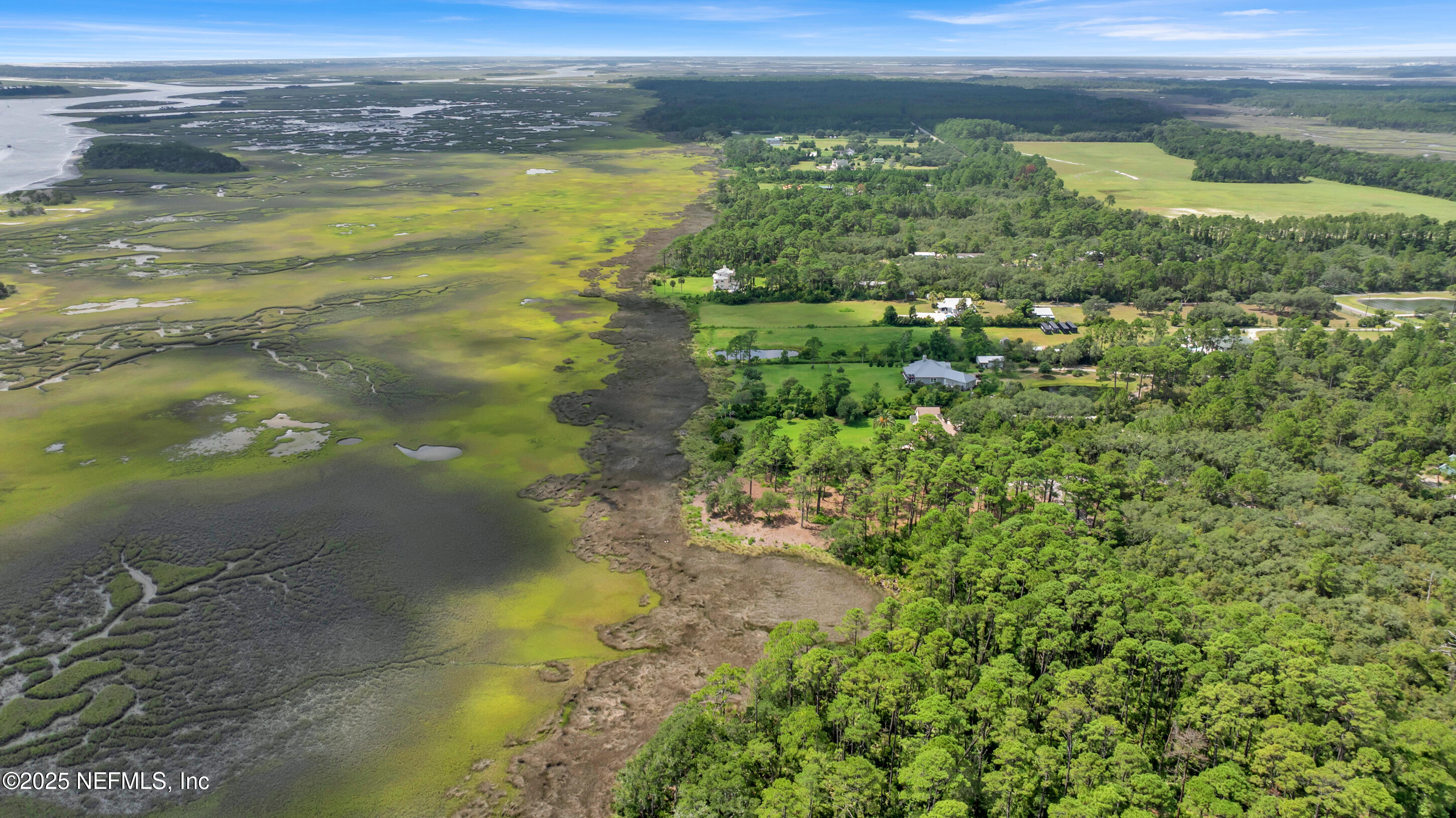 13091 Sawpit Road Jacksonville, FL 32226 - Photo 23 of 26 a view of a lake view of a house with a lake