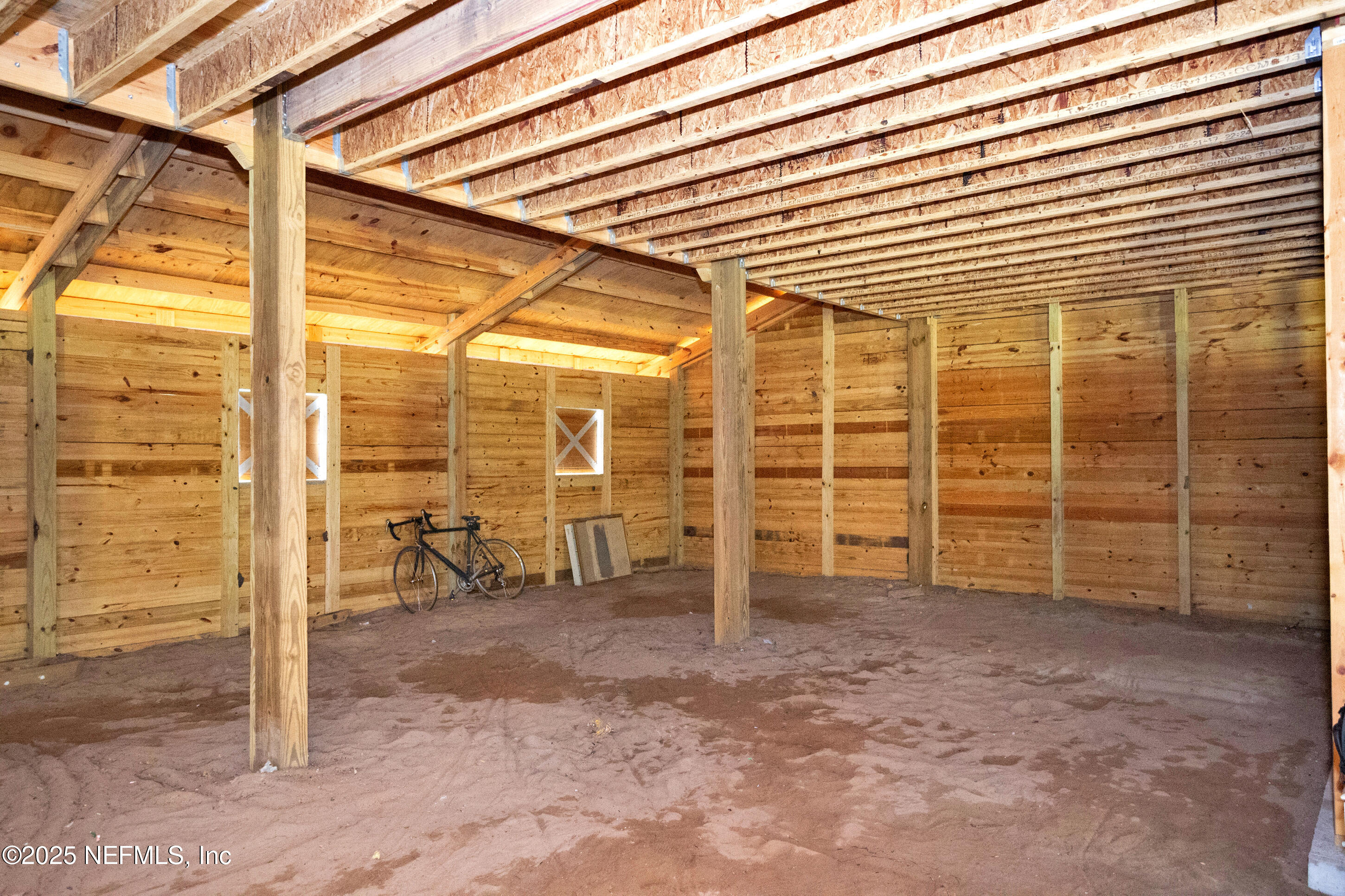 13091 Sawpit Road Jacksonville, FL 32226 - Photo 9 of 26 a view of an empty room with a glass door and furniture