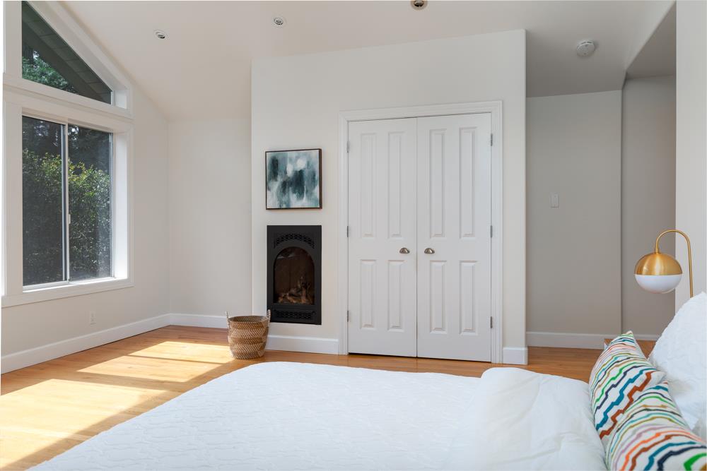 4399 Porter Gulch Road Aptos, CA 95003 - Photo 12 of 32 a bedroom with a bed and a window