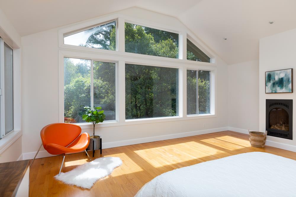 4399 Porter Gulch Road Aptos, CA 95003 - Photo 13 of 32 a bedroom with a bed and a window