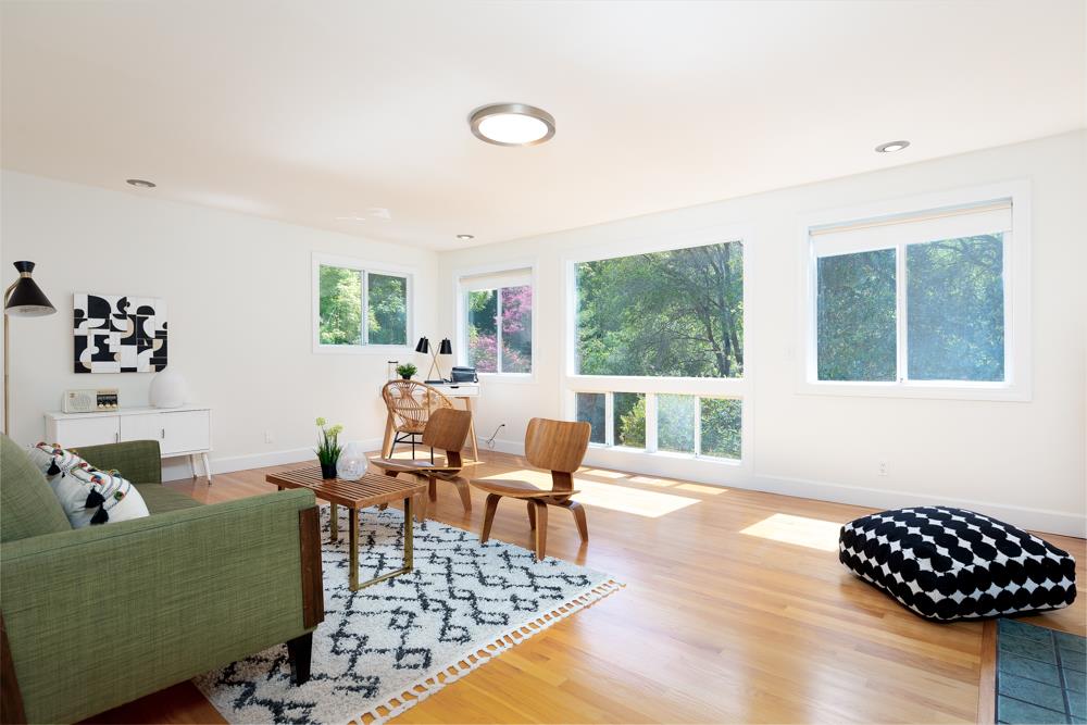 4399 Porter Gulch Road Aptos, CA 95003 - Photo 19 of 32 a living room with furniture and a window