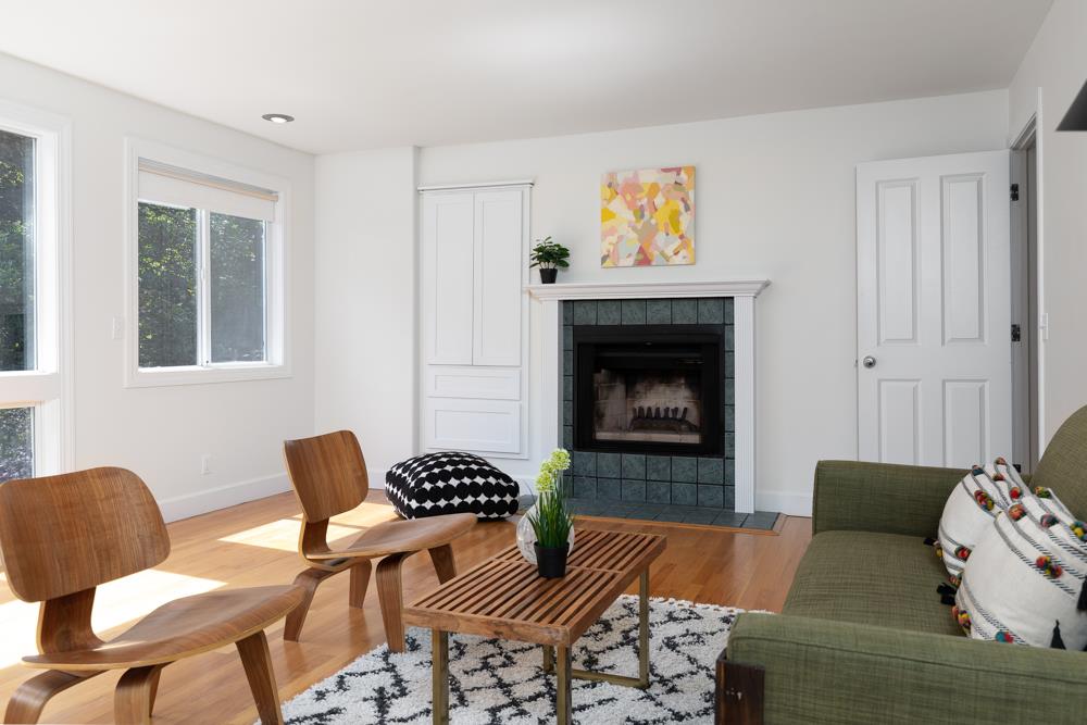 4399 Porter Gulch Road Aptos, CA 95003 - Photo 20 of 32 a living room with furniture and a fireplace