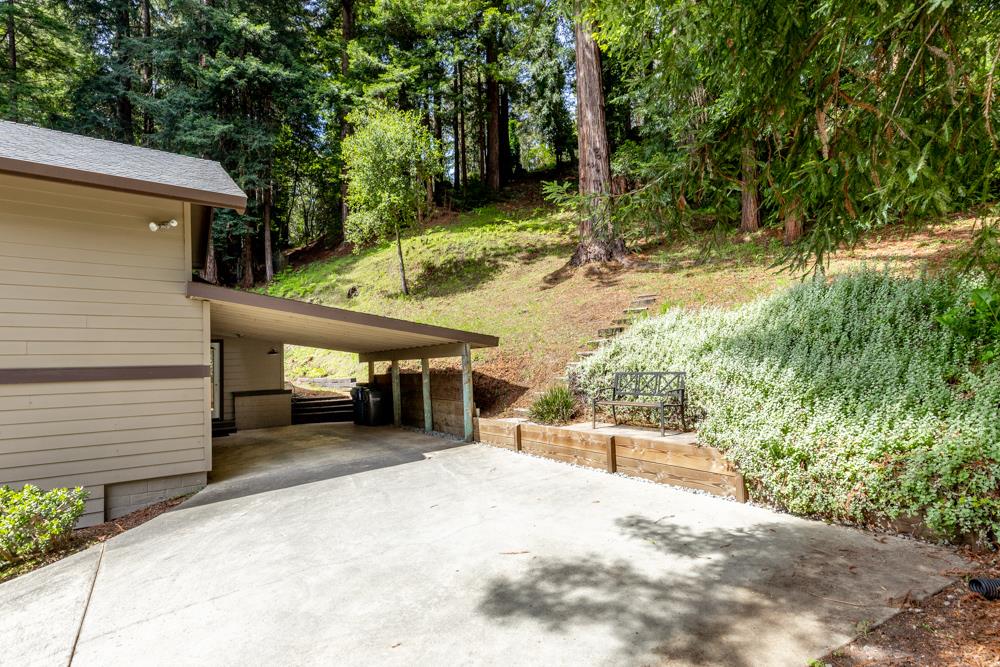 4399 Porter Gulch Road Aptos, CA 95003 - Photo 29 of 32 a view of a house with a yard