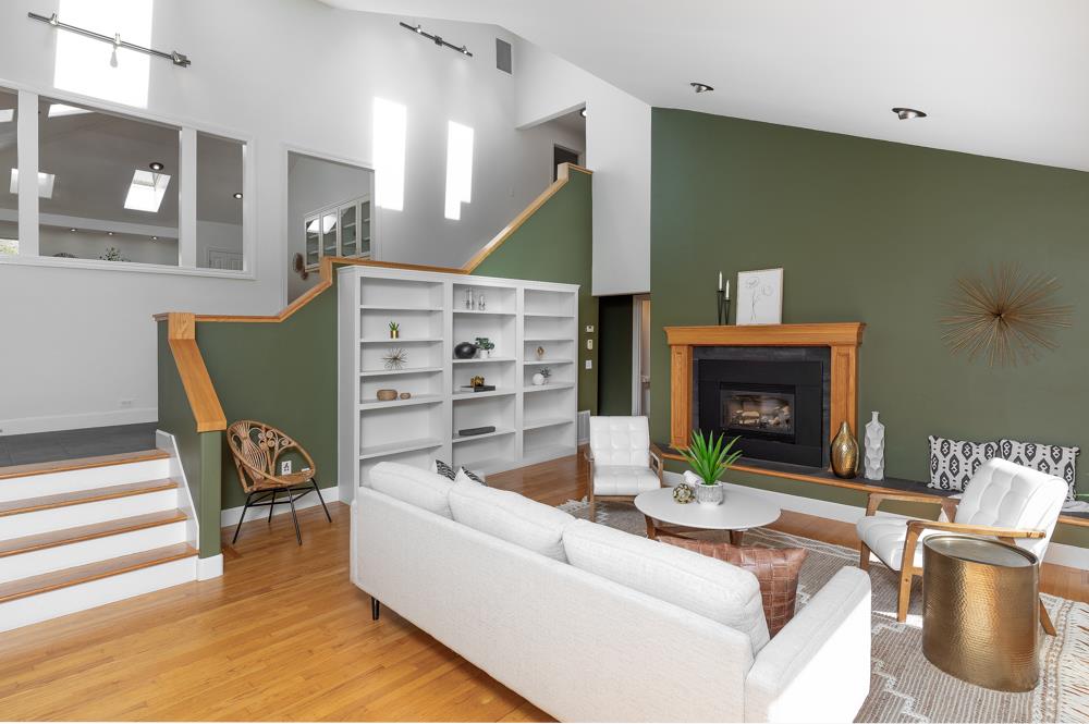 4399 Porter Gulch Road Aptos, CA 95003 - Photo 3 of 32 a living room with furniture and a fireplace