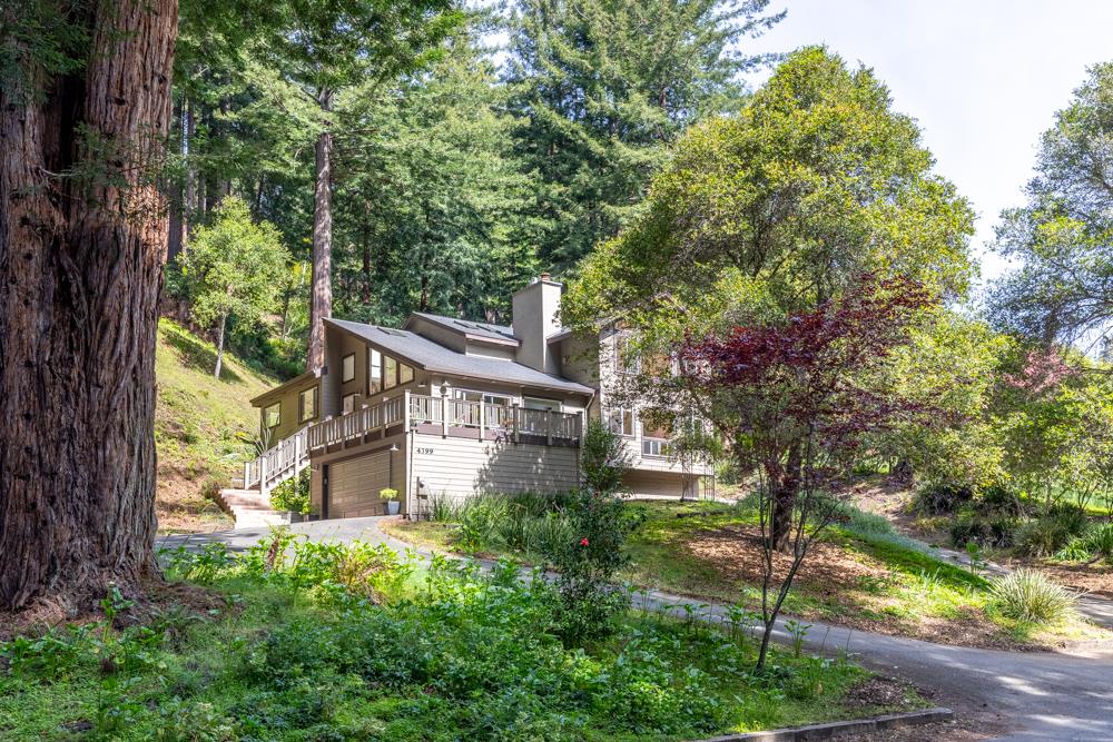 4399 Porter Gulch Road Aptos, CA 95003 - Photo 31 of 32 a house that has tree in front of it