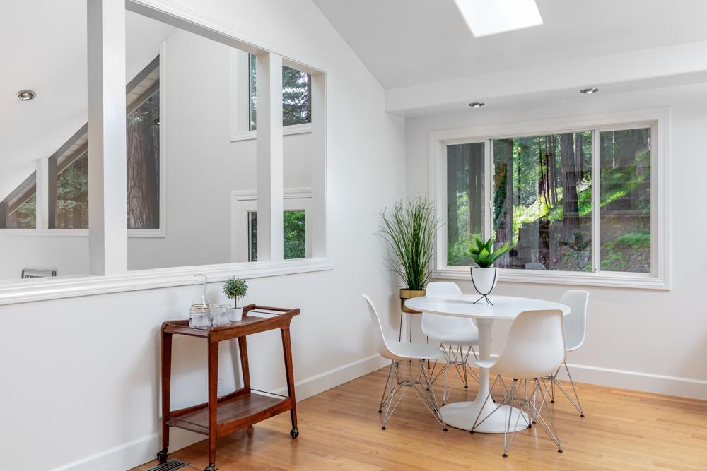 4399 Porter Gulch Road Aptos, CA 95003 - Photo 6 of 32 a view of a dining room with furniture window and wooden floor