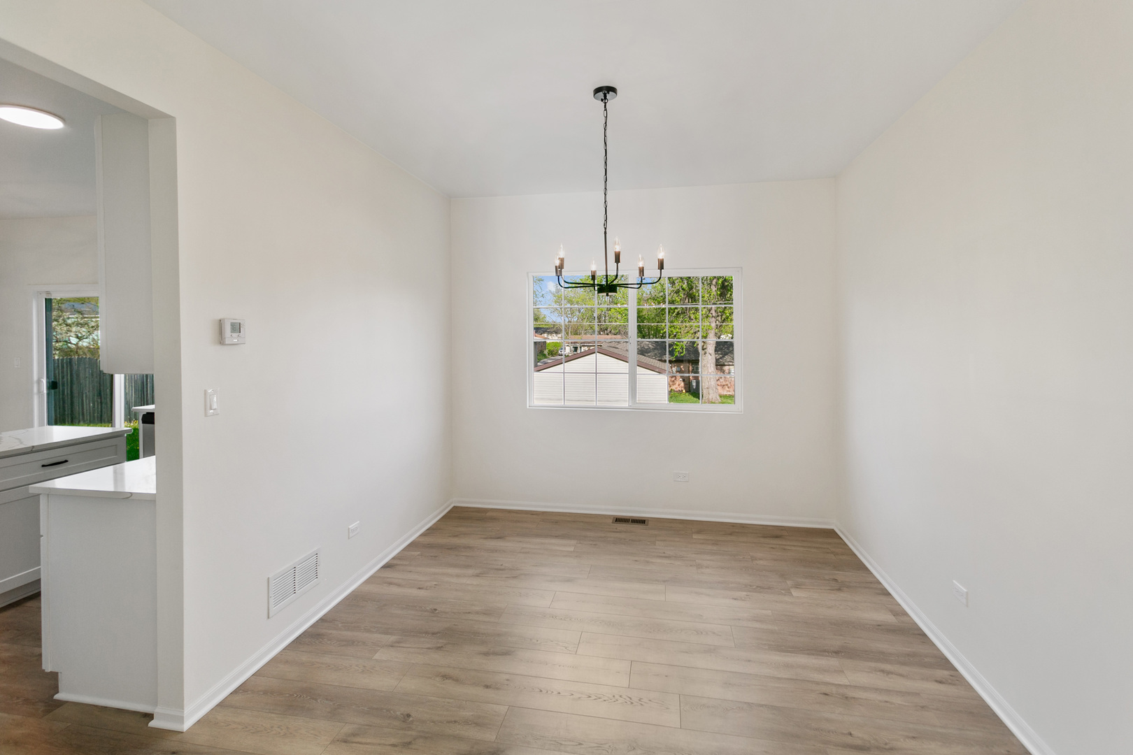 729 Wright Road University Park, IL 60484 - Photo 12 of 27 a view of an empty room with a window