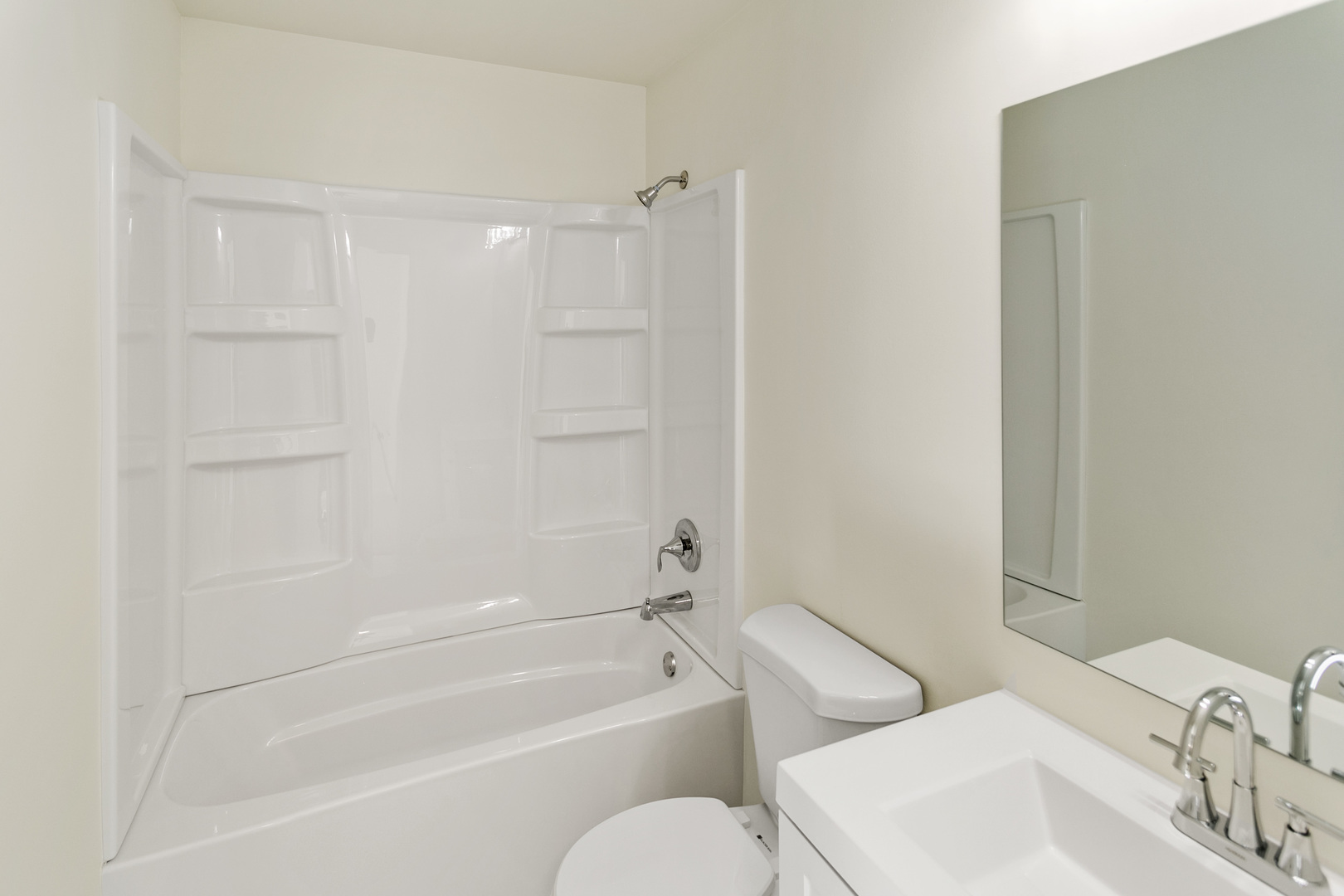 729 Wright Road University Park, IL 60484 - Photo 14 of 27 a bathroom with a bathtub shower sink vanity and a toilet