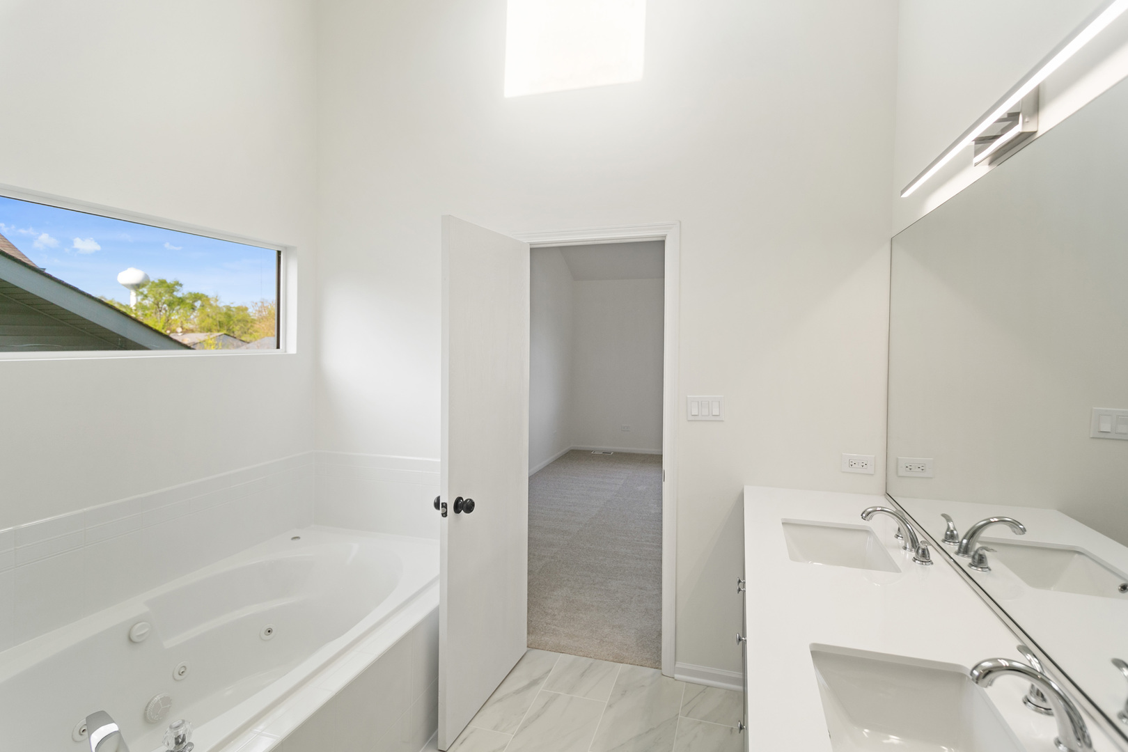 729 Wright Road University Park, IL 60484 - Photo 17 of 27 a bathroom with a tub sink and mirror