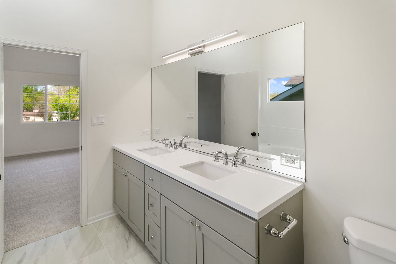 729 Wright Road University Park, IL 60484 - Photo 19 of 27 a bathroom with a sink and a mirror