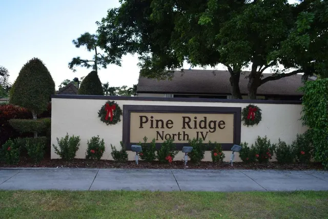 a view of a swimming pool with a terrace