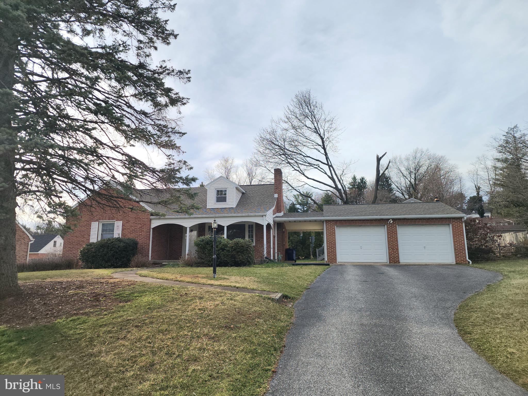 405 Beaumont Road York, PA 17403 - Photo 1 of 30 a front view of a house with a yard