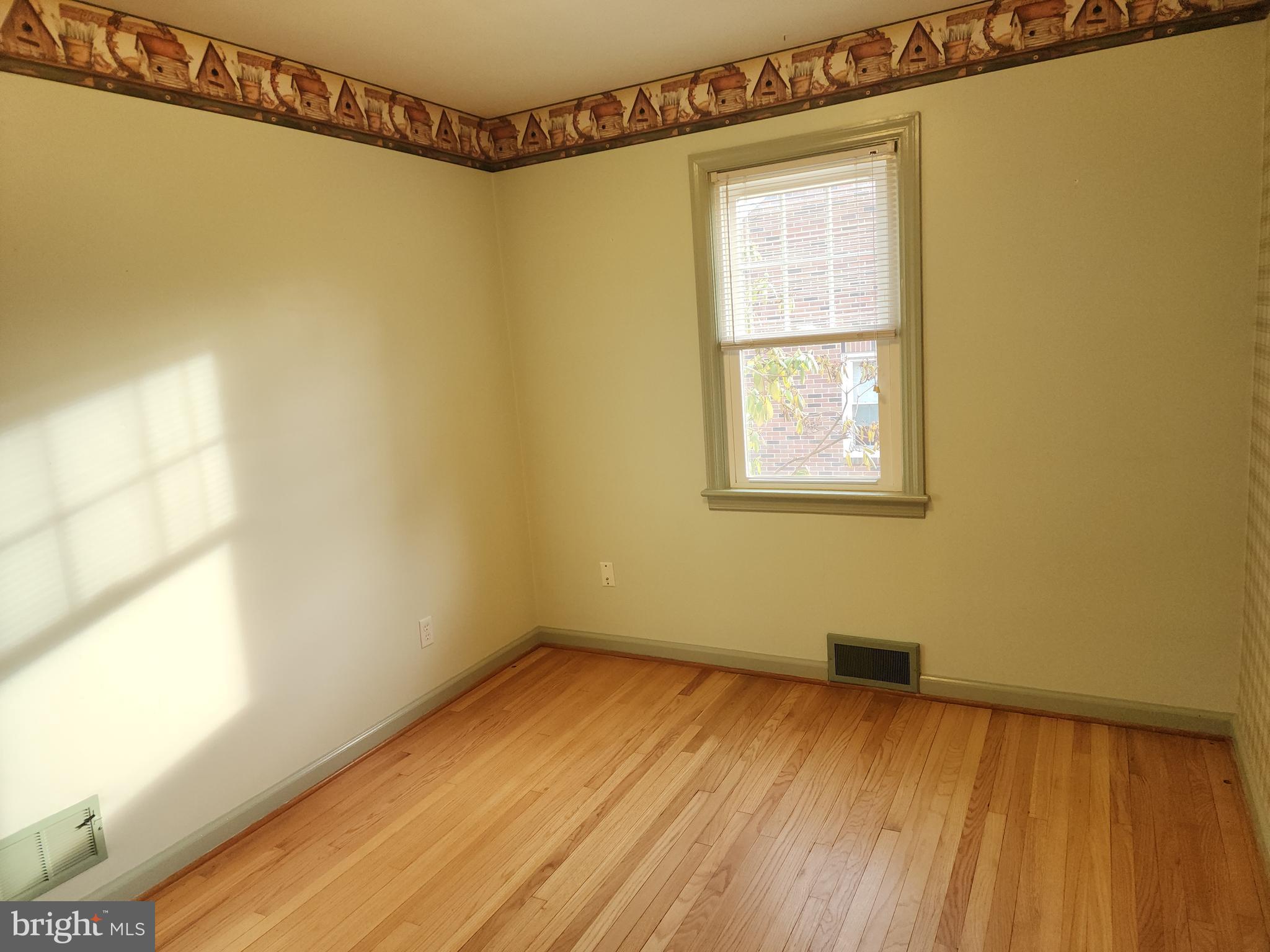 405 Beaumont Road York, PA 17403 - Photo 15 of 30 a view of a room with wooden floor and small window