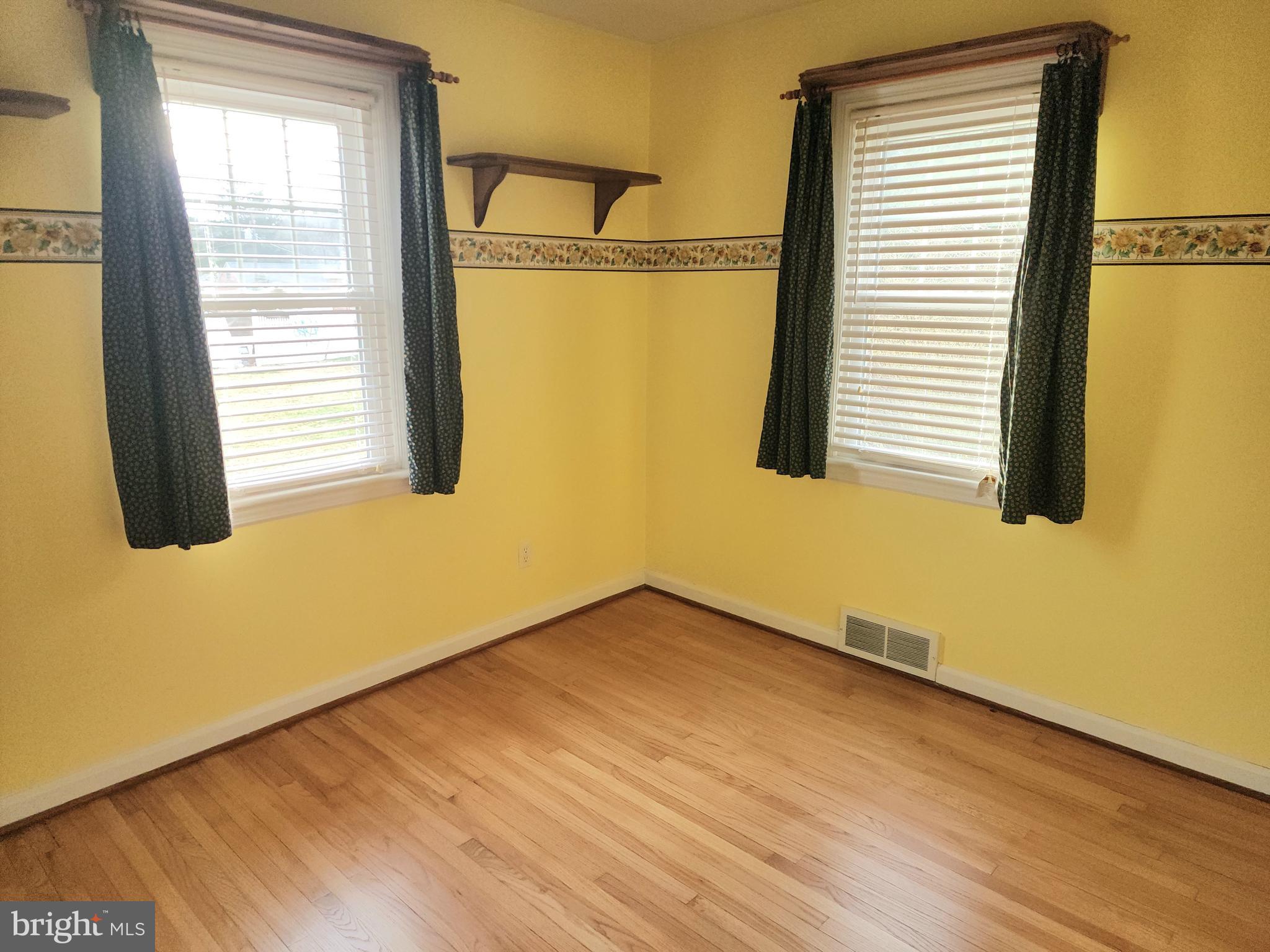405 Beaumont Road York, PA 17403 - Photo 16 of 30 a view of a room with wooden floor and windows