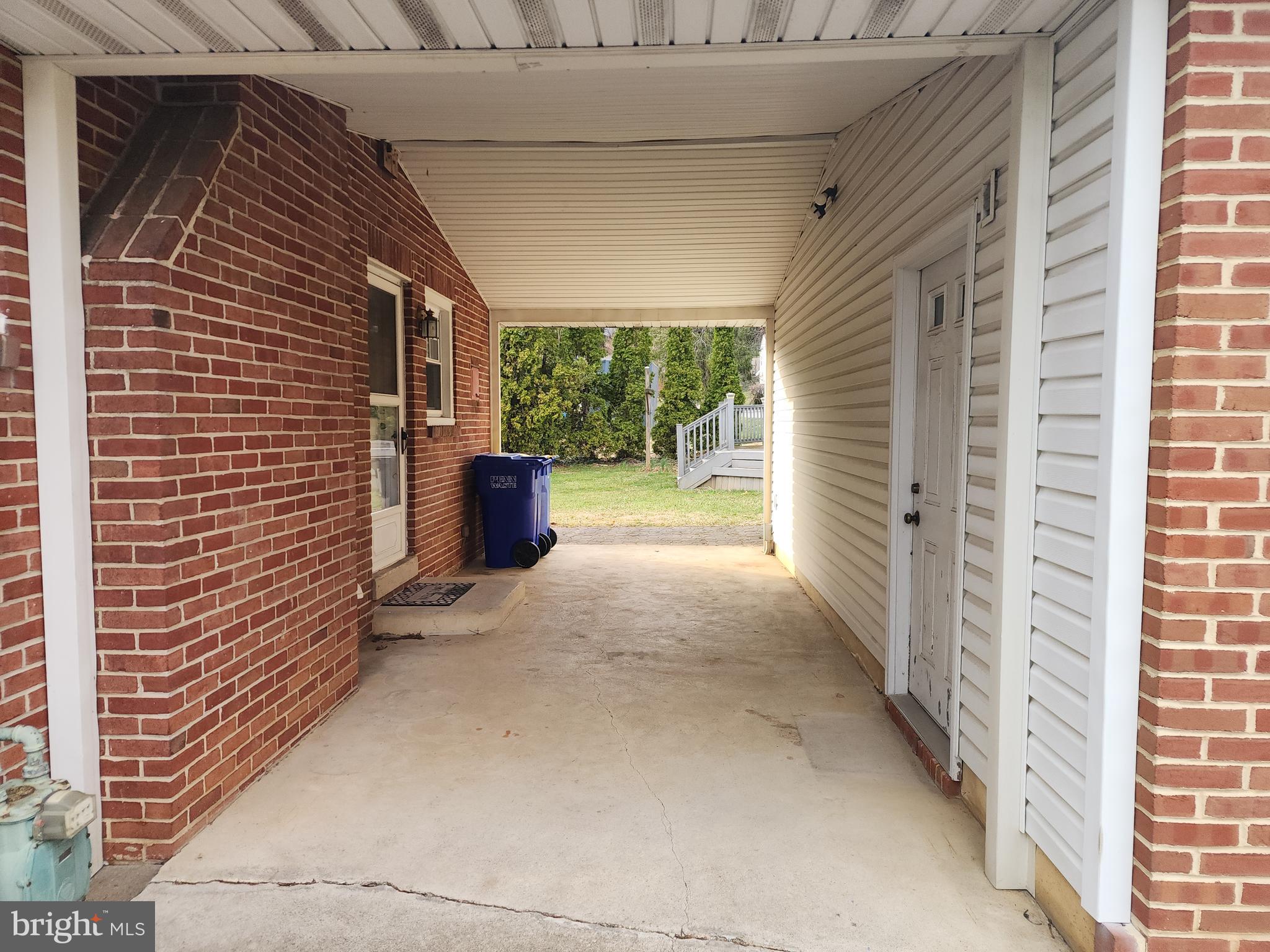 405 Beaumont Road York, PA 17403 - Photo 2 of 30 a view of a porch with wooden floor and a fireplace