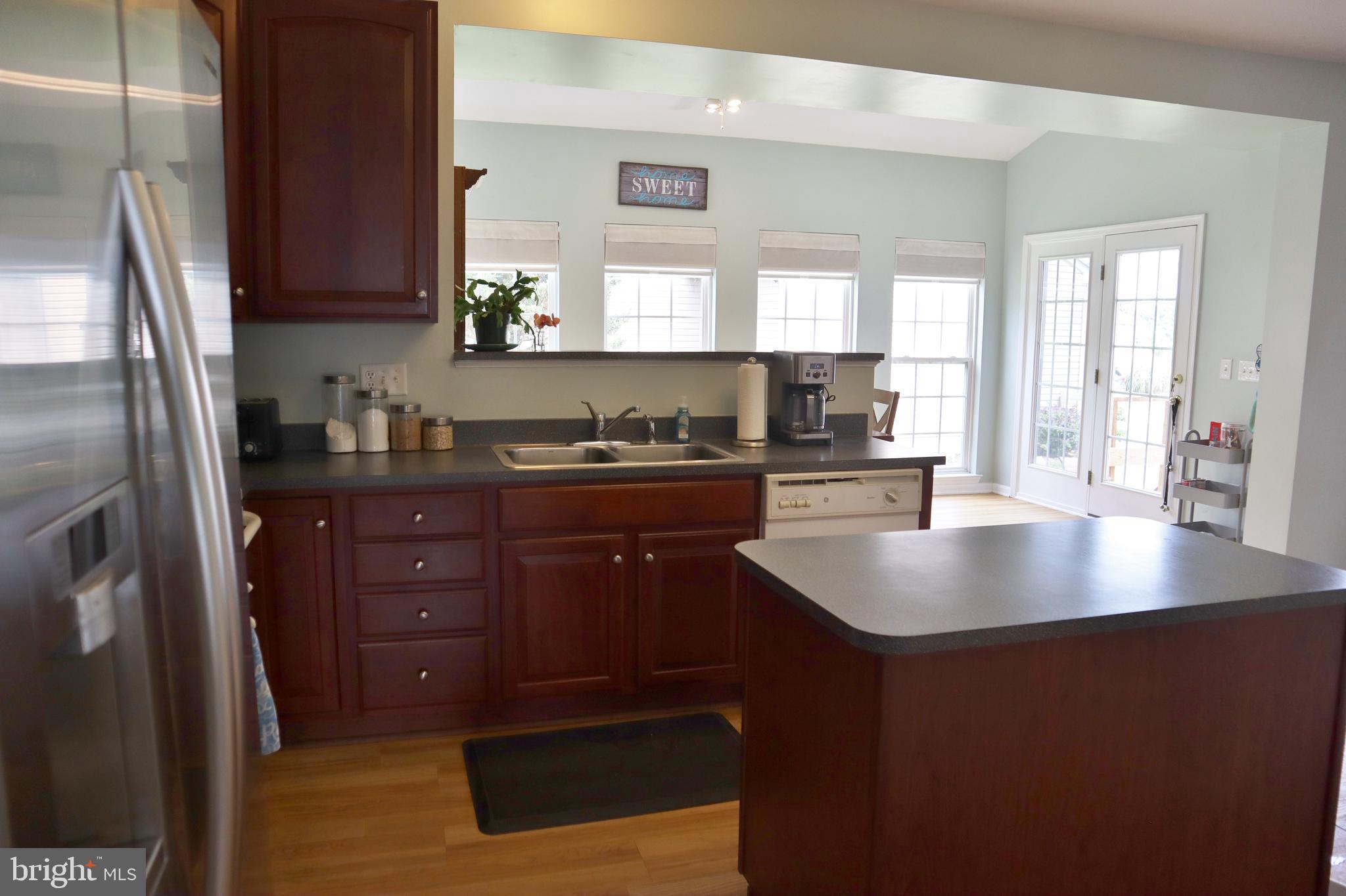 175 Tweedsmere Drive Townsend, DE 19734 - Photo 4 of 34 Kitchen into Sunroom