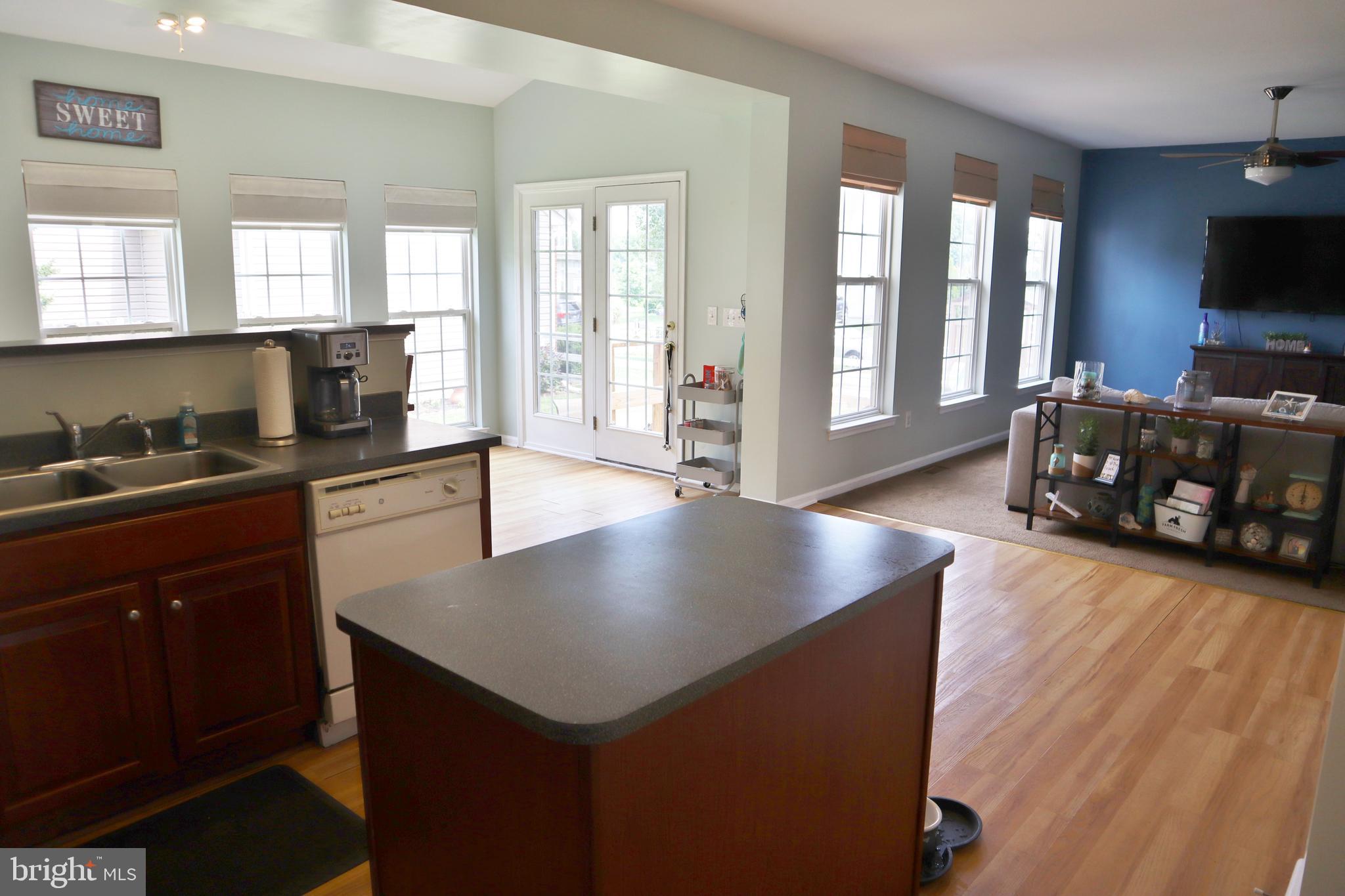 175 Tweedsmere Drive Townsend, DE 19734 - Photo 5 of 34 Kitchen into SR & LR