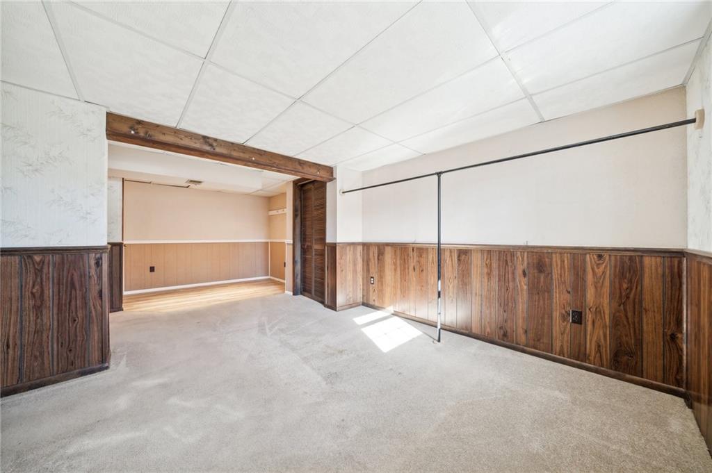 1828 Ivanhoe Drive Irwin, PA 15642 - Photo 20 of 33 a view of an empty room with wooden floor